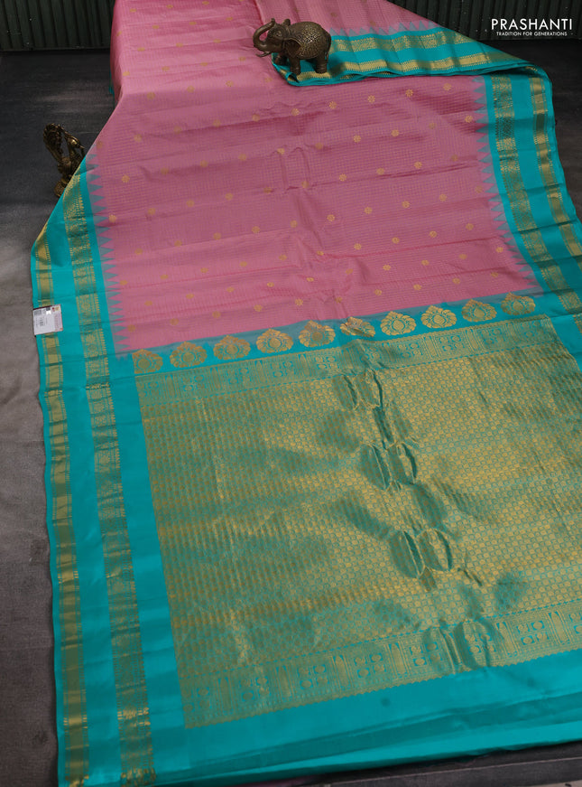 Pure gadwal silk saree pastel pink and teal green with allover zari checks & buttas and temple design rettapet zari woven border
