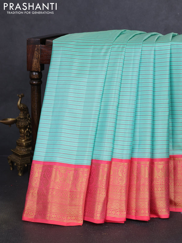 Pure gadwal silk saree teal blue and peach pink shade with allover stripe pattern and zari woven korvai border