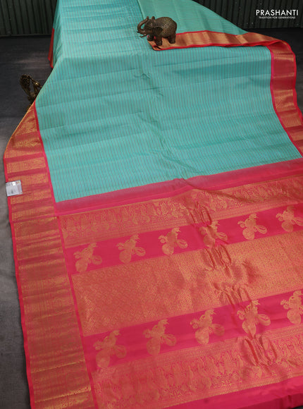 Pure gadwal silk saree teal blue and peach pink shade with allover stripe pattern and zari woven korvai border
