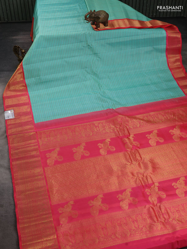 Pure gadwal silk saree teal blue and peach pink shade with allover stripe pattern and zari woven korvai border