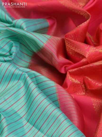 Pure gadwal silk saree teal blue and peach pink shade with allover stripe pattern and zari woven korvai border