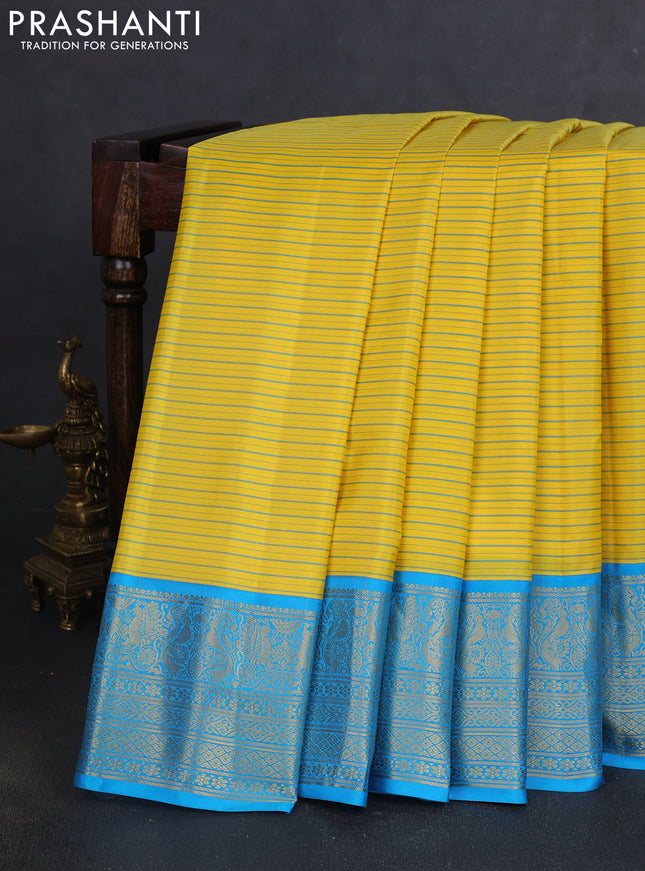 Pure gadwal silk saree yellow and cs blue with allover stripe pattern and zari woven korvai border