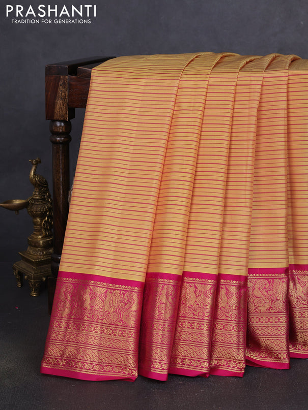 Pure gadwal silk saree pale yellow and pink with allover stripe pattern and zari woven korvai border