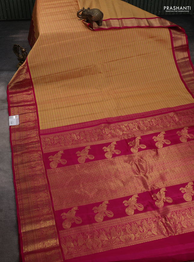 Pure gadwal silk saree pale yellow and pink with allover stripe pattern and zari woven korvai border