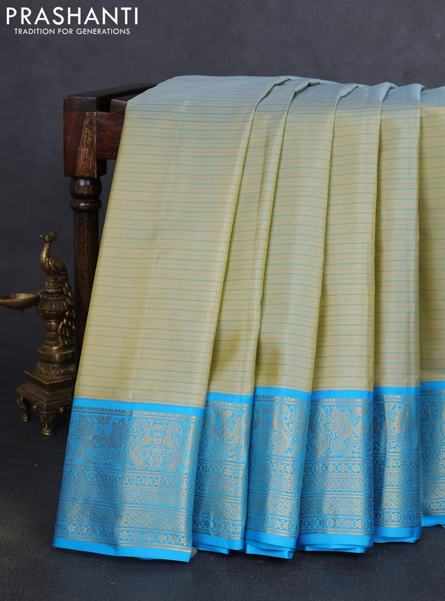 Pure gadwal silk saree pastel green and cs blue with allover stripe pattern and zari woven korvai border