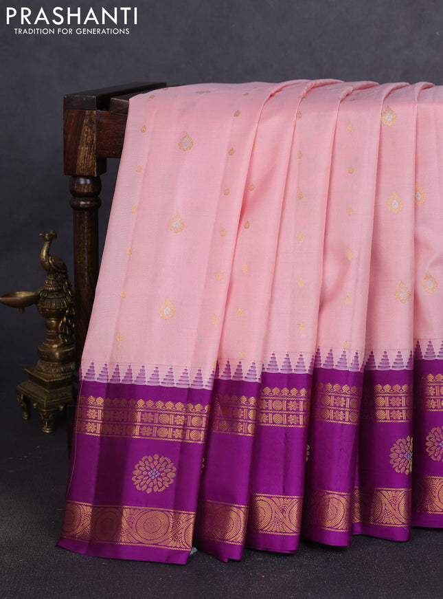 Pure gadwal silk saree pastel peach and purple with zari woven buttas and temple design rettapet zari woven butta border