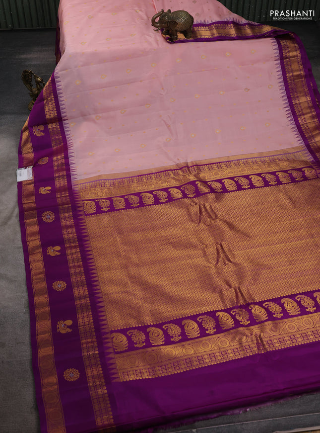 Pure gadwal silk saree pastel peach and purple with zari woven buttas and temple design rettapet zari woven butta border