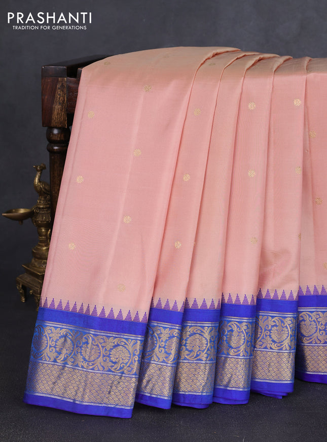 Pure gadwal silk saree pastel peach and blue with zari woven buttas and temple design zari woven border