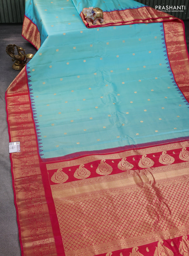 Pure gadwal silk saree teal blue and pink with annam & rudhraksha zari woven buttas and temple design zari woven border