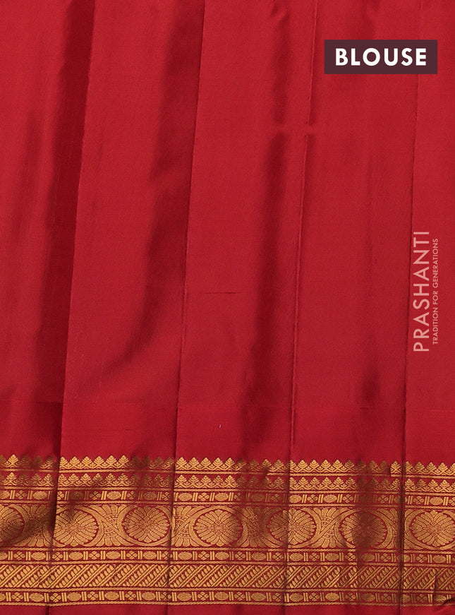 Pure gadwal silk saree mild pista green and orange with allover checks & zari buttas and temple design zari woven border