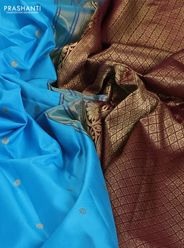 Pure gadwal silk saree light blue and brown with zari woven buttas and temple design zari woven border