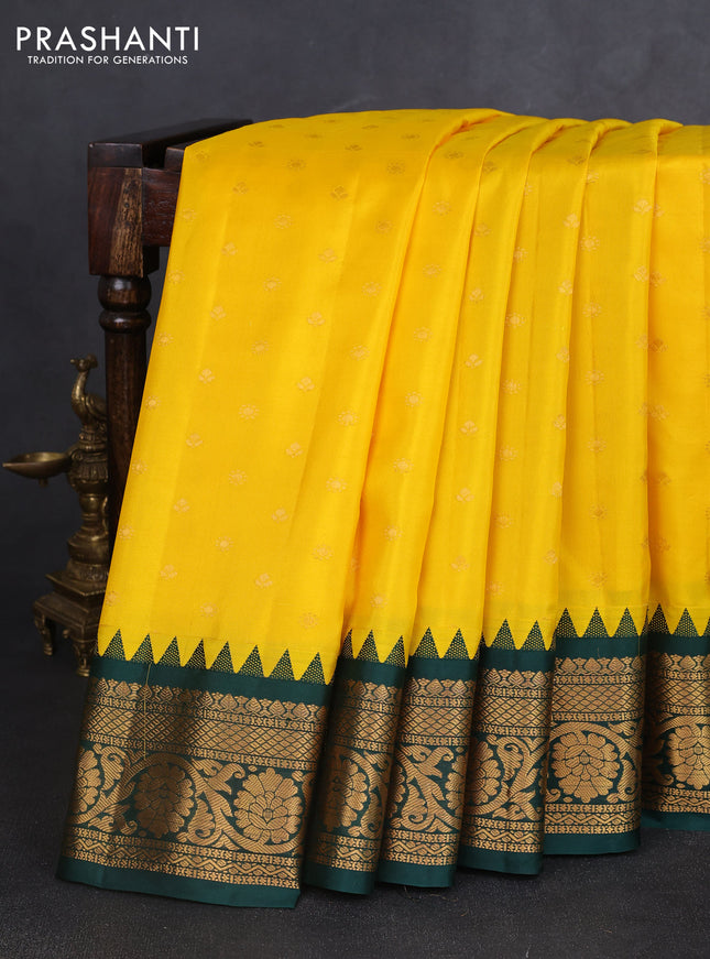 Pure gadwal silk saree yellow and bottle green with zari woven buttas and temple design zari woven border