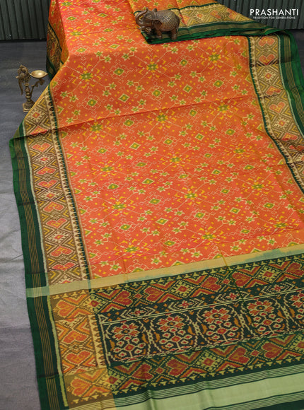 Rajkot patola silk saree dual shade of sunset orange and bottle green with allover ikat weaves and long ikat woven border