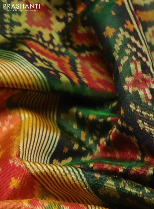 Rajkot patola silk saree dual shade of sunset orange and bottle green with allover ikat weaves and long ikat woven border