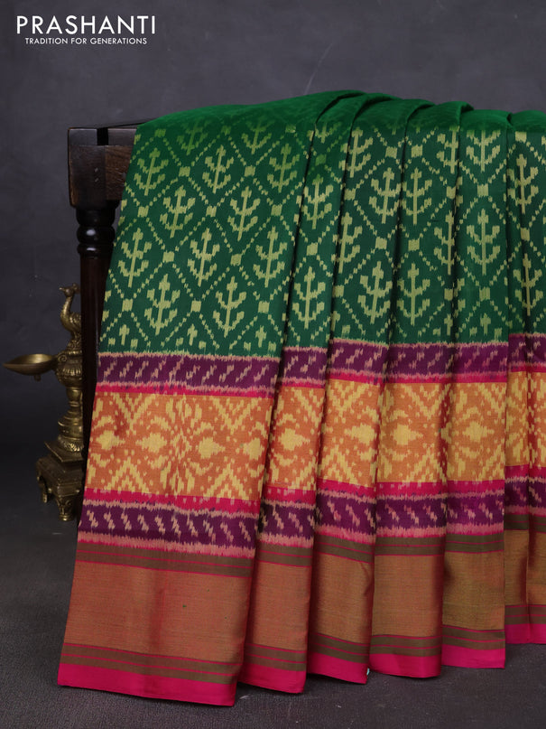 Rajkot patola silk saree bottle green and pink with allover ikat weaves and long ikat woven zari border