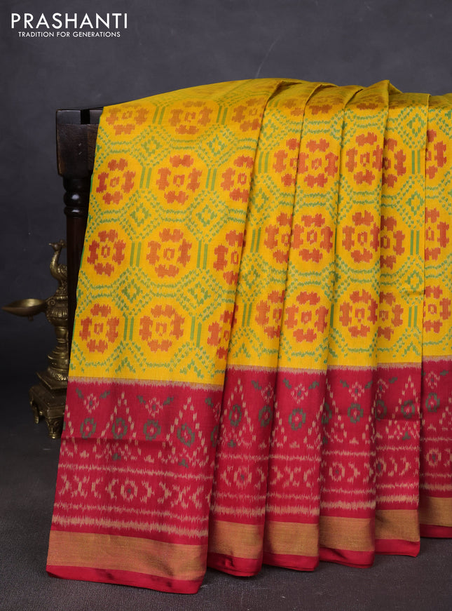 Rajkot patola silk saree yellow and red with allover ikat weaves and long ikat woven zari border