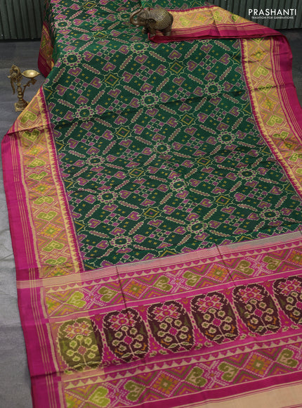 Rajkot patola silk saree green and pink with allover ikat weaves and ikat woven border