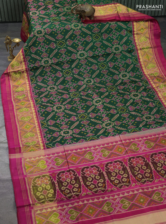 Rajkot patola silk saree green and pink with allover ikat weaves and ikat woven border