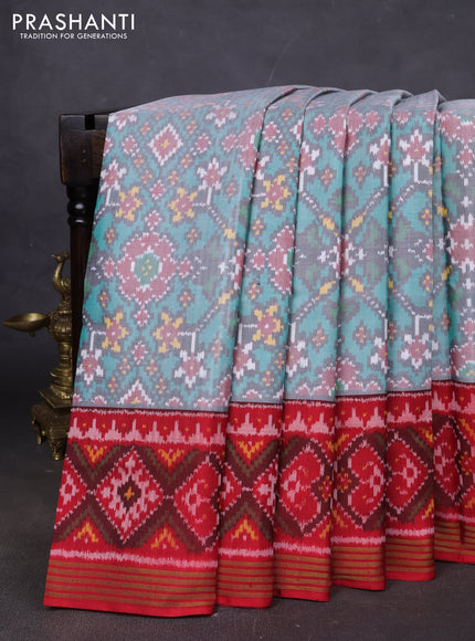 Rajkot patola silk saree tea l blue and red with allover ikat weaves and ikat woven zari border