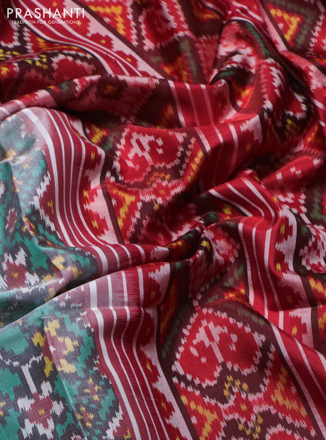 Rajkot patola silk saree tea l blue and red with allover ikat weaves and ikat woven zari border