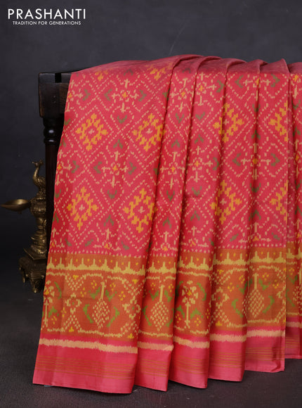 Rajkot patola silk saree peach pink shade with allover ikat weaves and ikat woven border