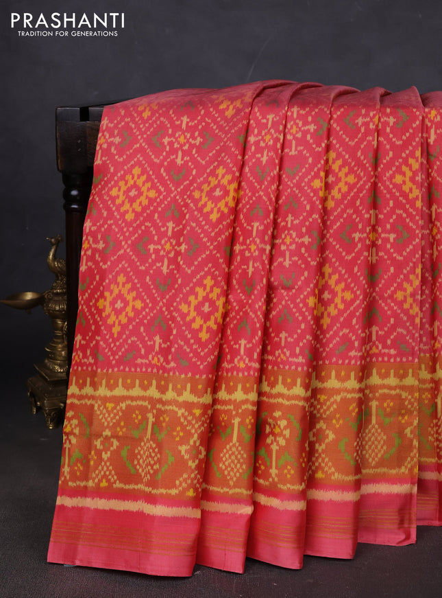 Rajkot patola silk saree peach pink shade with allover ikat weaves and ikat woven border