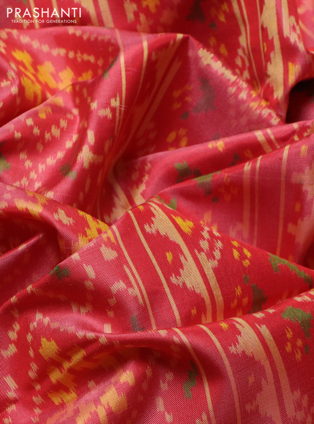 Rajkot patola silk saree peach pink shade with allover ikat weaves and ikat woven border