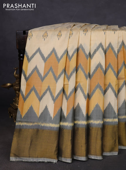 Rajkot patola silk saree cream and grey yellow with allover ikat butta weaves and ganga jamuna border