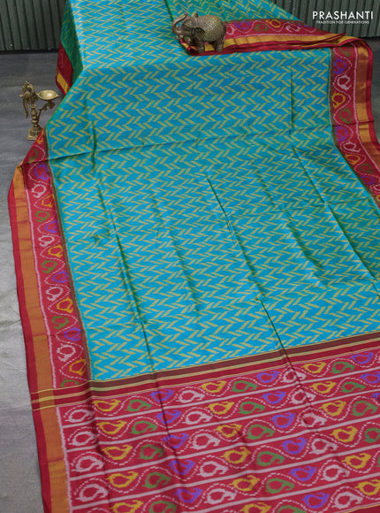 Rajkot patola silk saree teal blue and maroon with allover ikat weaves and ikat woven border