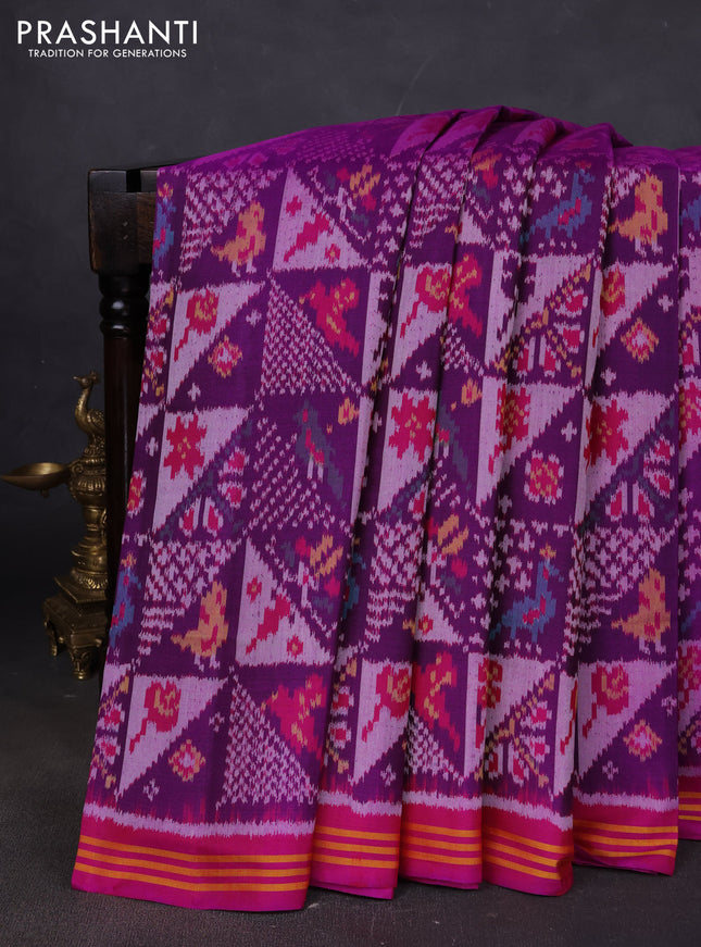 Rajkot patola silk saree purple and darl magenta pink with allover ikat weaves and ikat woven border