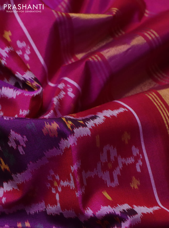 Rajkot patola silk saree purple and darl magenta pink with allover ikat weaves and ikat woven border