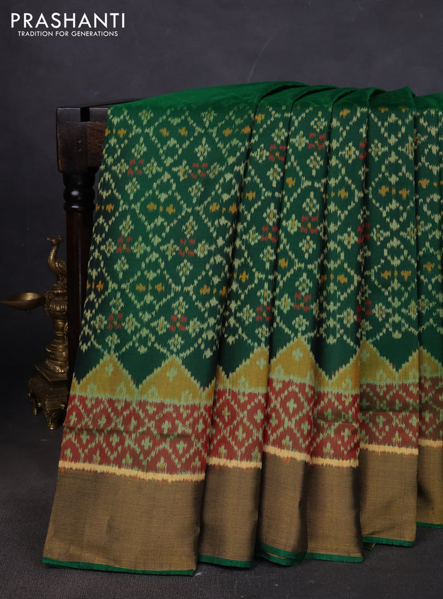 Rajkot patola silk saree bottle green and dark mustard maroon with allover ikat weaves and ikat woven border