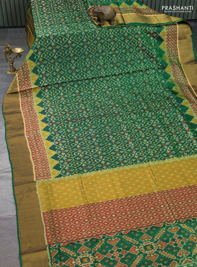 Rajkot patola silk saree bottle green and dark mustard maroon with allover ikat weaves and ikat woven border