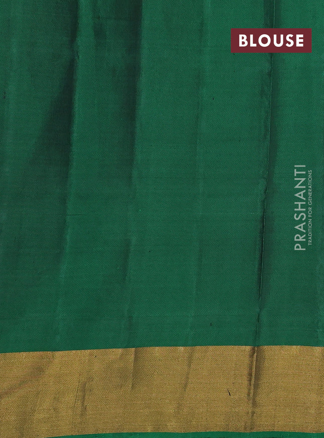Rajkot patola silk saree bottle green and dark mustard maroon with allover ikat weaves and ikat woven border