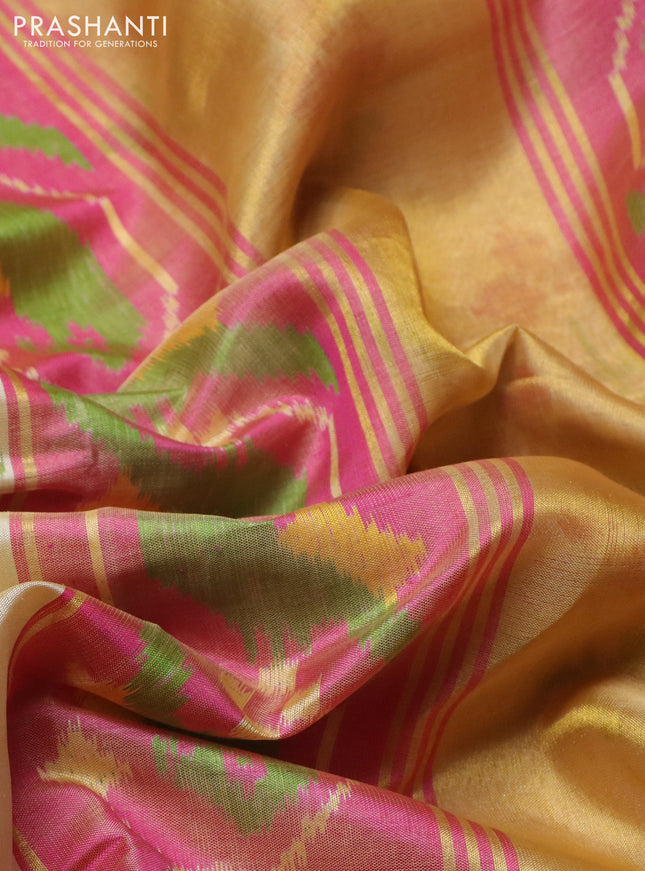 Rajkot patola silk saree cream and pink with allover ikat butta weaves and long ikat woven zari border