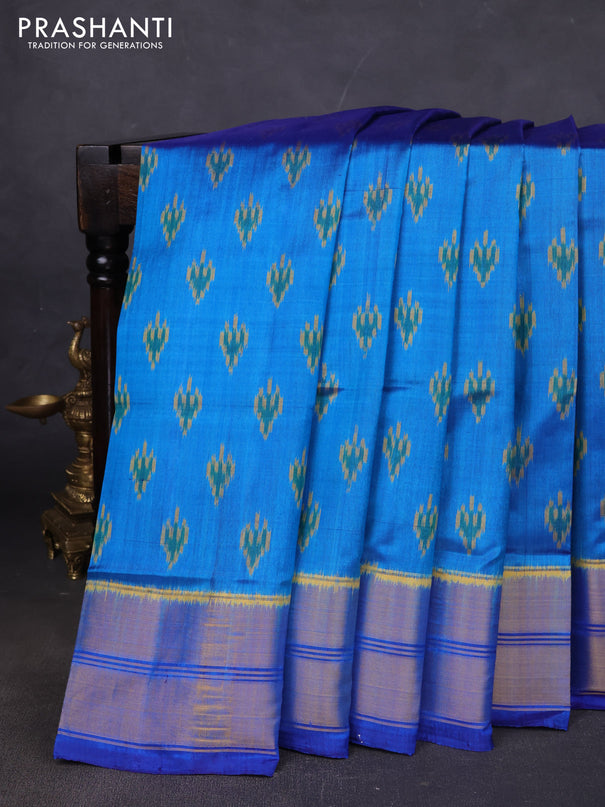 Rajkot patola silk saree blue with allover ikat butta weaves and long ikat woven zari border