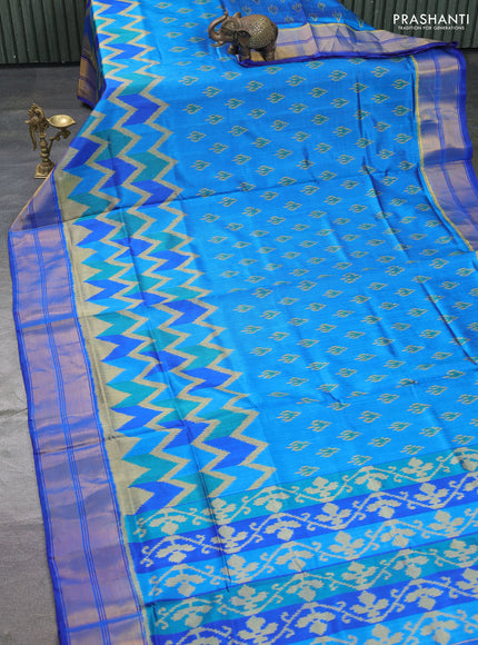 Rajkot patola silk saree blue with allover ikat butta weaves and long ikat woven zari border