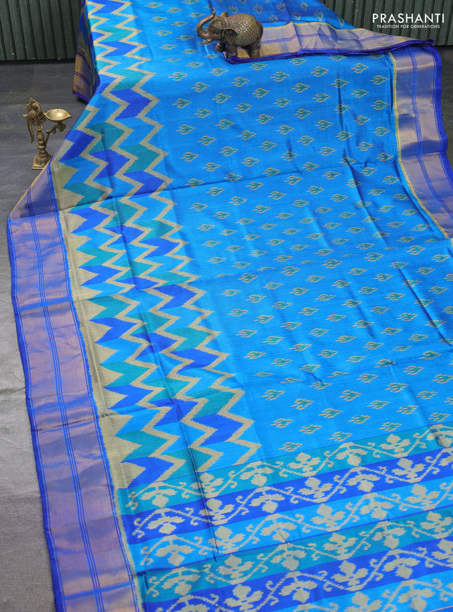 Rajkot patola silk saree blue with allover ikat butta weaves and long ikat woven zari border