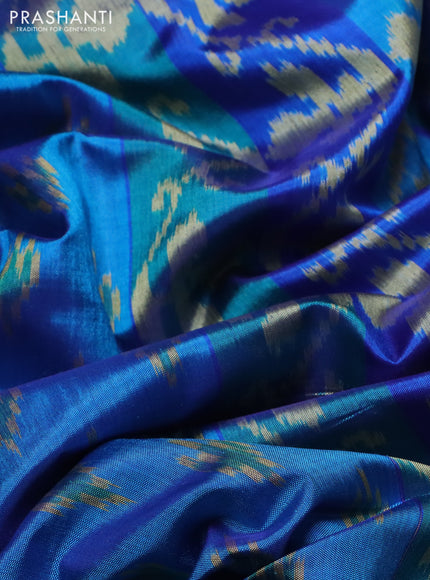 Rajkot patola silk saree blue with allover ikat butta weaves and long ikat woven zari border