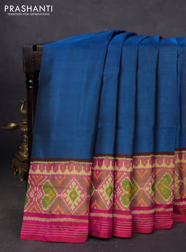 Rajkot patola silk saree peacock blue and pink with plain body and long ikat woven zari border