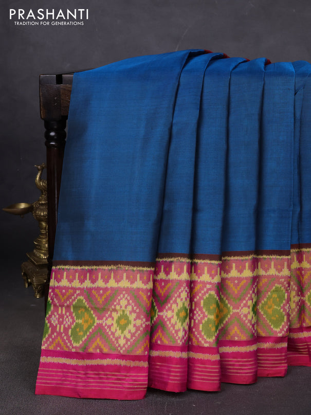 Rajkot patola silk saree peacock blue and pink with plain body and long ikat woven zari border