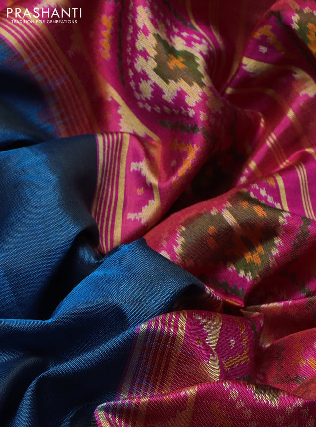 Rajkot patola silk saree peacock blue and pink with plain body and long ikat woven zari border