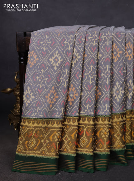 Rajkot patola silk saree grey and green with allover ikat weaves and ikat woven zari border