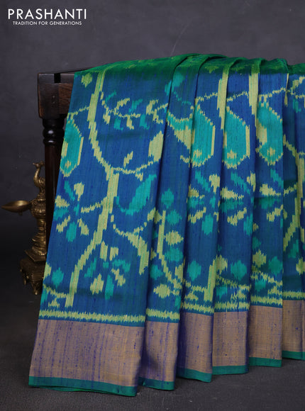 Rajkot patola silk saree dual shade of bluish green with allover ikat weaves & jute finish and zari woven border