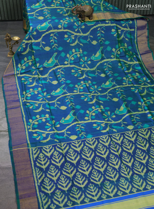 Rajkot patola silk saree dual shade of bluish green with allover ikat weaves & jute finish and zari woven border