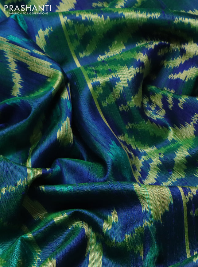 Rajkot patola silk saree dual shade of bluish green with allover ikat weaves & jute finish and zari woven border