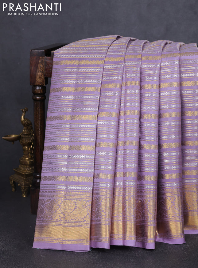 Pure kanchipuram silk saree pastel lavender with allover veldhari zari weaves and rich zari woven border