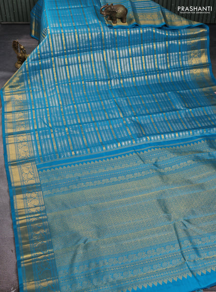 Pure kanchipuram silk saree teal blue with allover veldhari zari weaves and rich zari woven border
