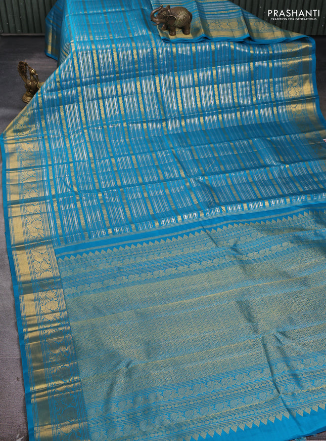 Pure kanchipuram silk saree teal blue with allover veldhari zari weaves and rich zari woven border