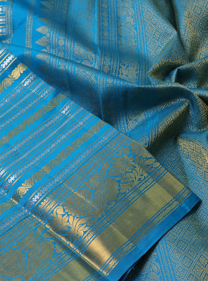 Pure kanchipuram silk saree teal blue with allover veldhari zari weaves and rich zari woven border